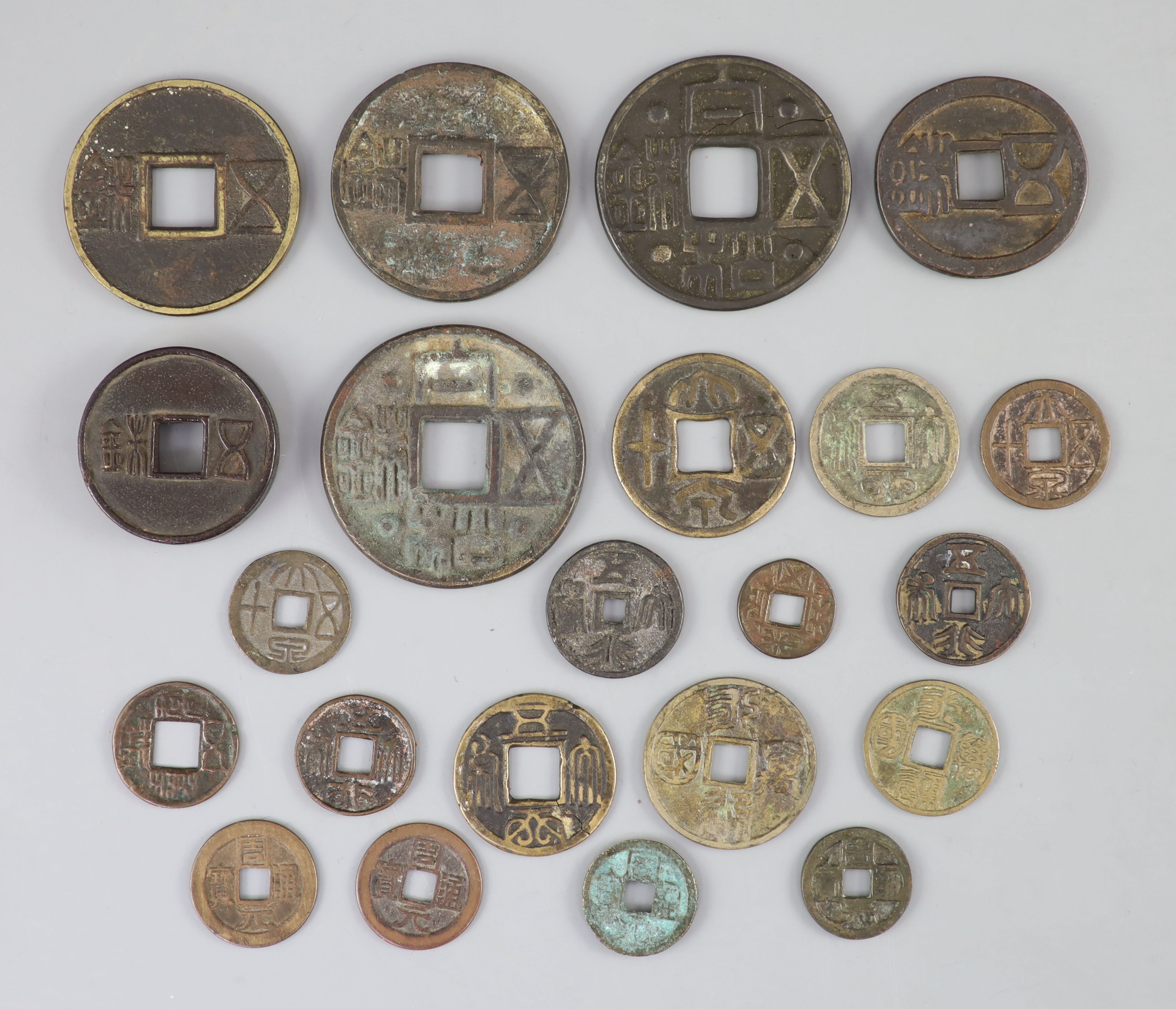 China, a group of 6 bronze coin charms or amulets, 19th century and various Thai (Siamese) porcelain gaming counters,